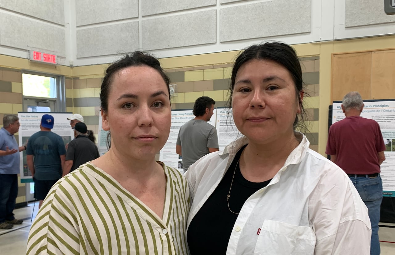 A photo of two Algonquin leaders at a public meeting
