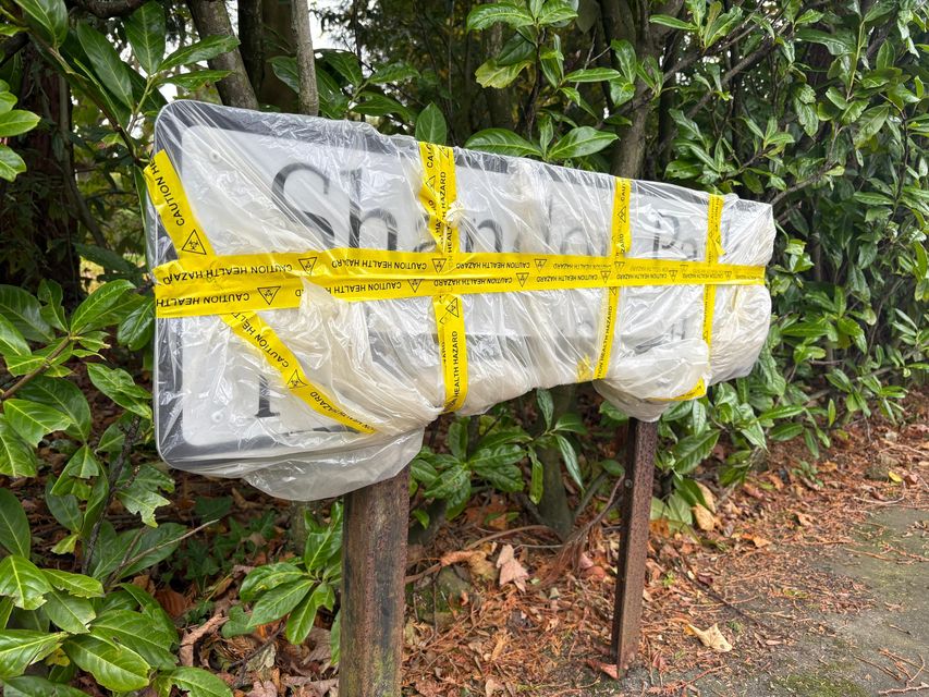 The damaged sign in east Belfast. Photo: Kirsten Elder for Belfast Telegraph