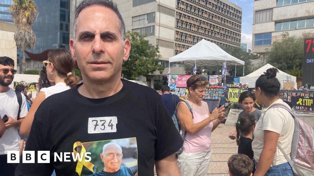 Son of hostage Amiram Cooper, whose body remains in Gaza, says 'it's not over'