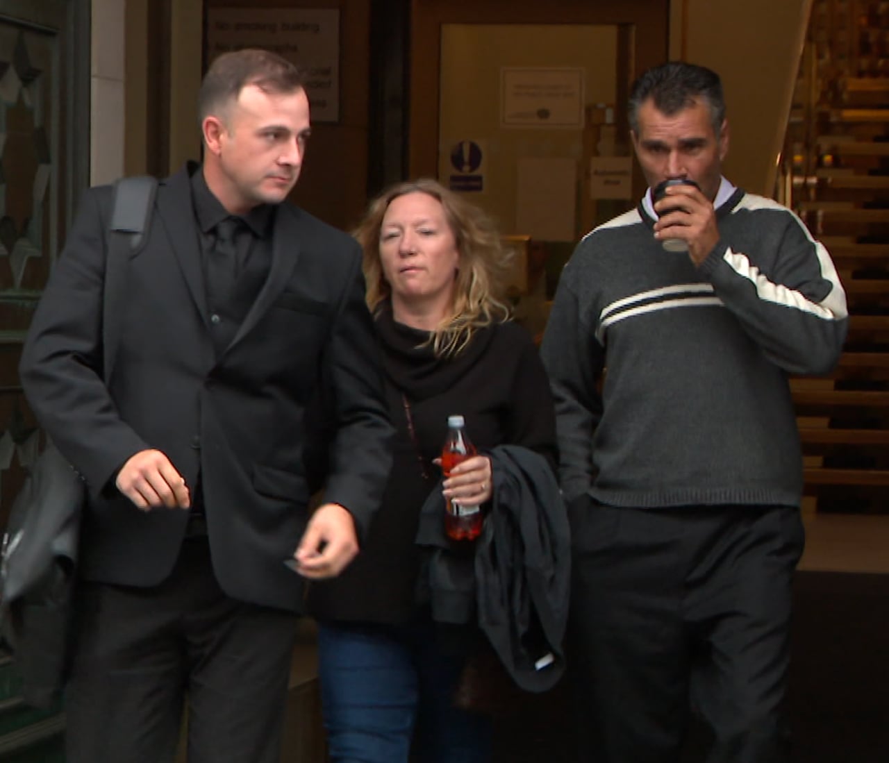 Clint Leveque (right) leaves Edinburgh High Court of Judiciary on Oct. 10