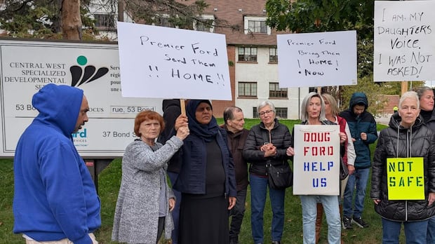 'I just don’t think management cares.' Family members protest after residents moved from group home