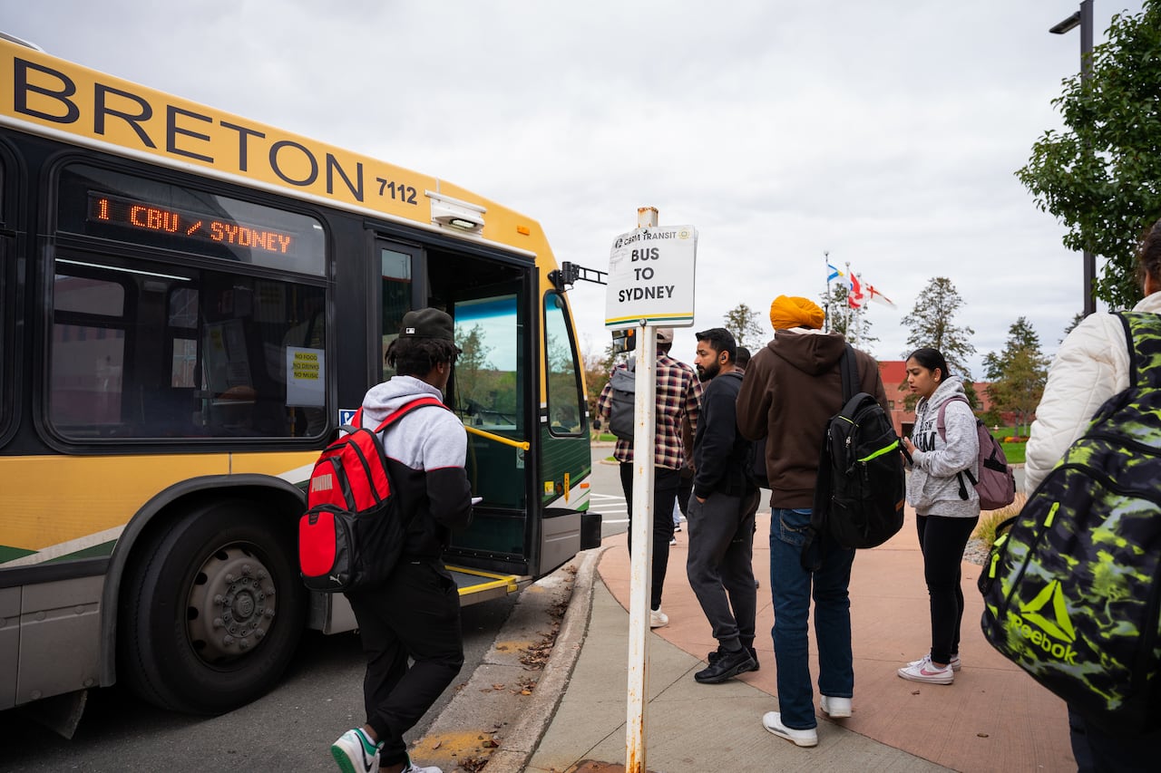 Cape Breton University students board the bus after class in Sydney, N.S., Wednesday, Oct. 18, 2023.
