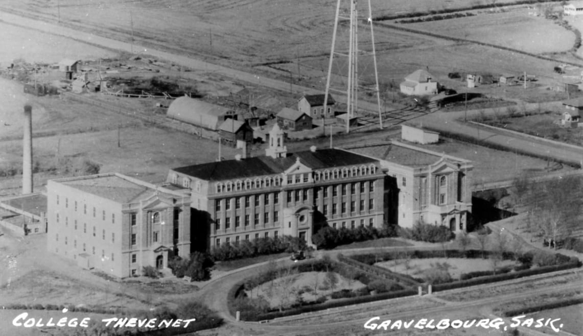 A black and white photo of a brick building, reading College Thevenet on the bottom left side and Gravelbourg, Sask. on the bottom right side.