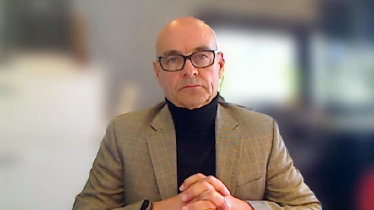 A man poses for a photo