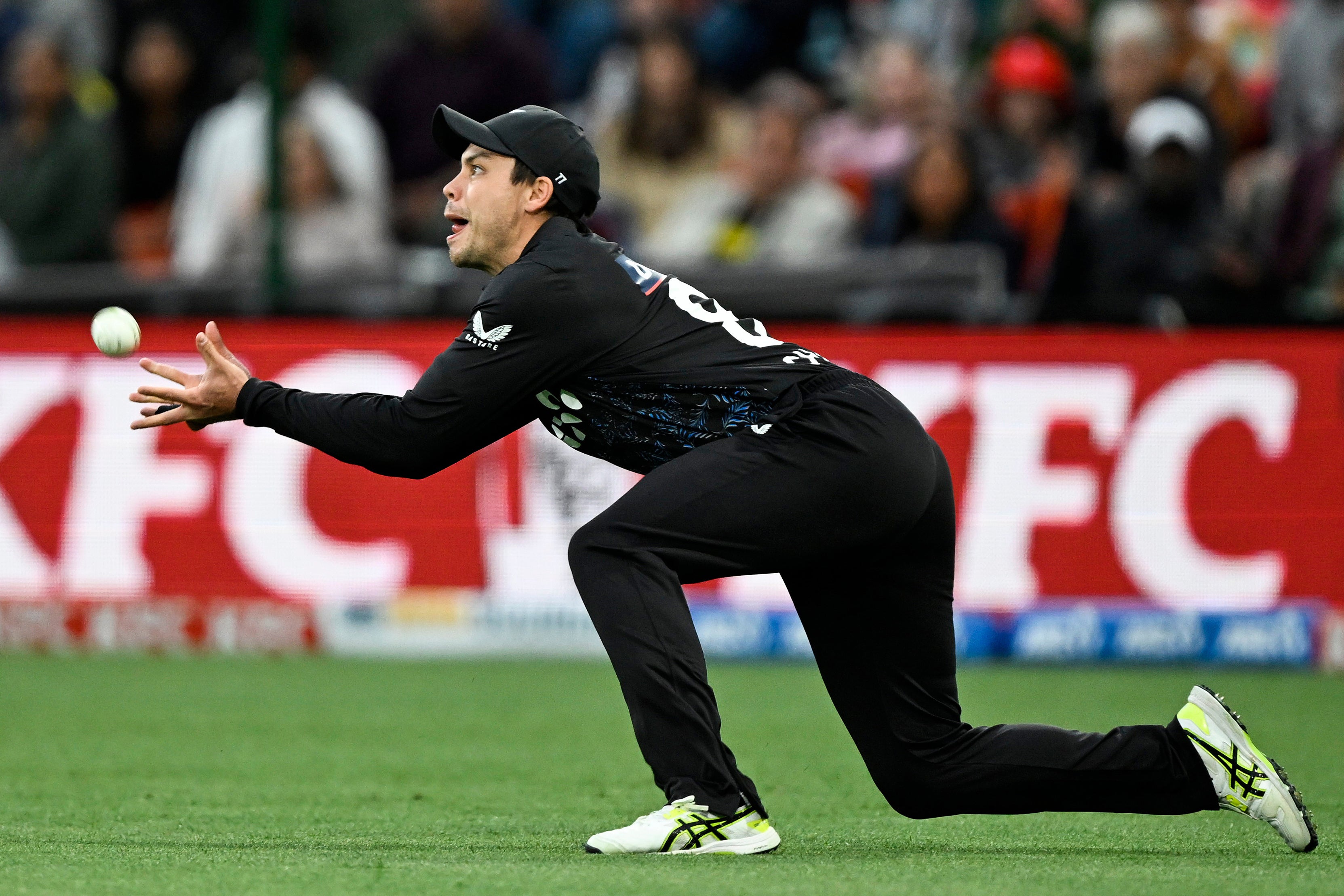 New Zealand’s Mark Chapman takes a catch to dismiss Phil Salt