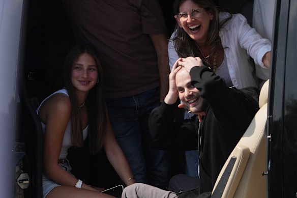 Freed Israeli hostage Alon Ohel gestures from a van as he arrives at Beilinson hospital in Petah Tikva, Israel.