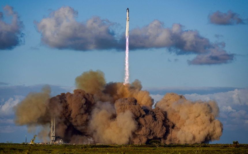 A SpaceX Super Heavy booster carrying the Starship spacecraft lifts off on its 11th test flight at the company's launchpad in Starbase, Texas, on October 13.