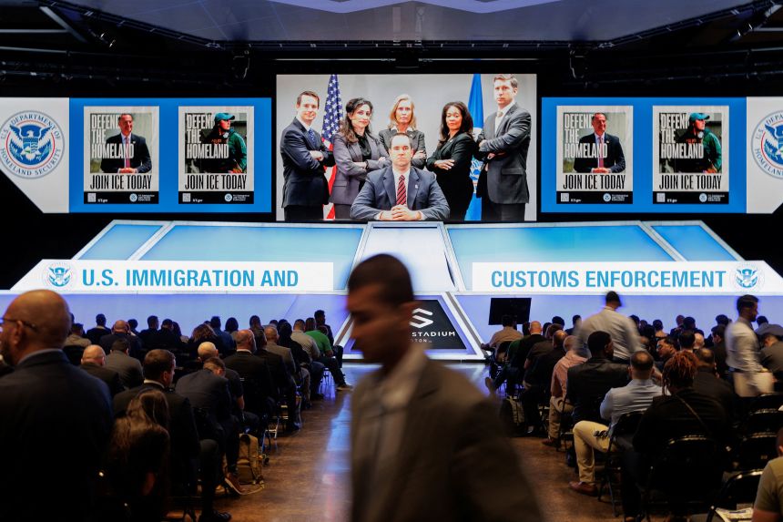 People attend an ICE job fair in Arlington, Texas, on August 26.
