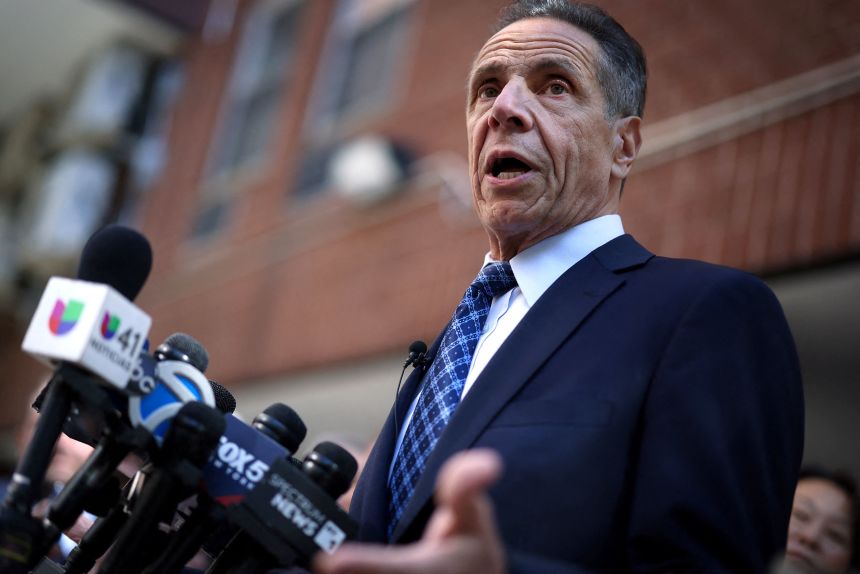 Former New York Governor and candidate for New York City Mayor Andrew Cuomo speaks to the press while campaigning in the Chinatown neighborhood of Manhattan in New York, on October 3, 2025.