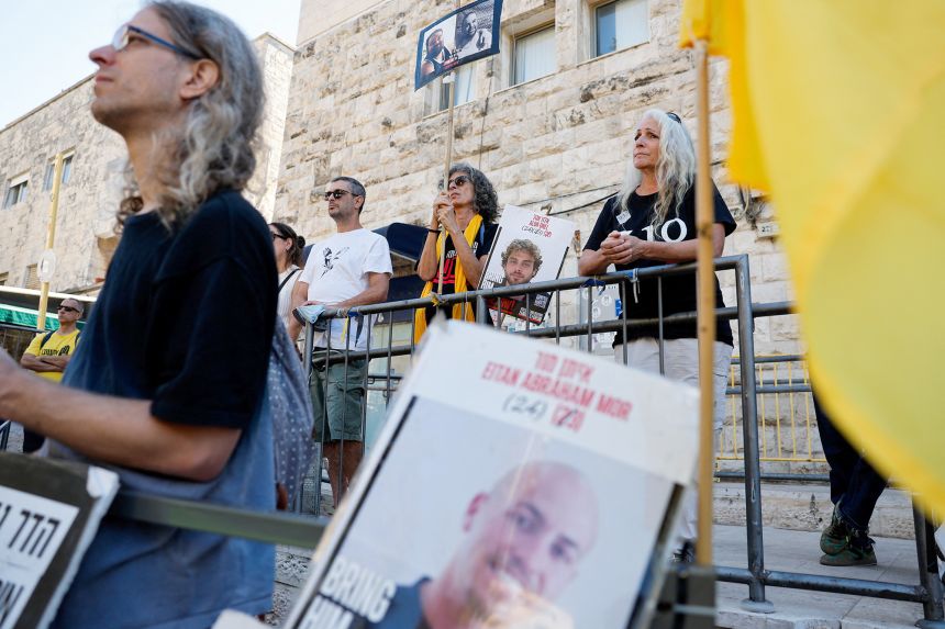 Families of hostages and their supporters protest outside Israeli Prime Minister Benjamin Netanyahu’s residence in Jerusalem on October 7, 2025.