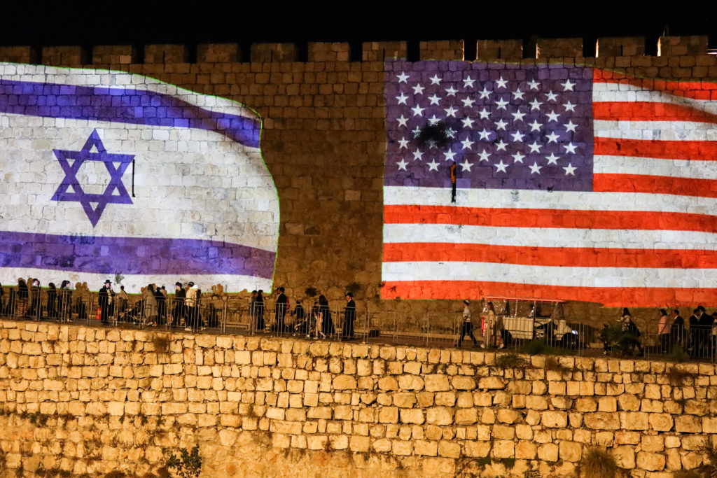 United States and Israel flags projected on the walls of the Old city of Jerusalem
