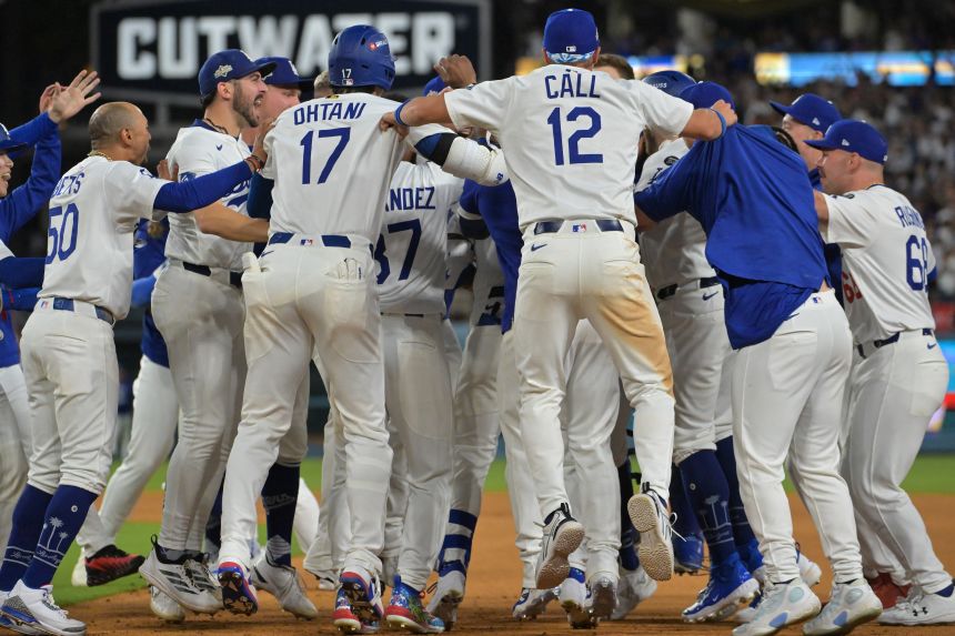Dodgers players flooded onto the field to celebrate the win.