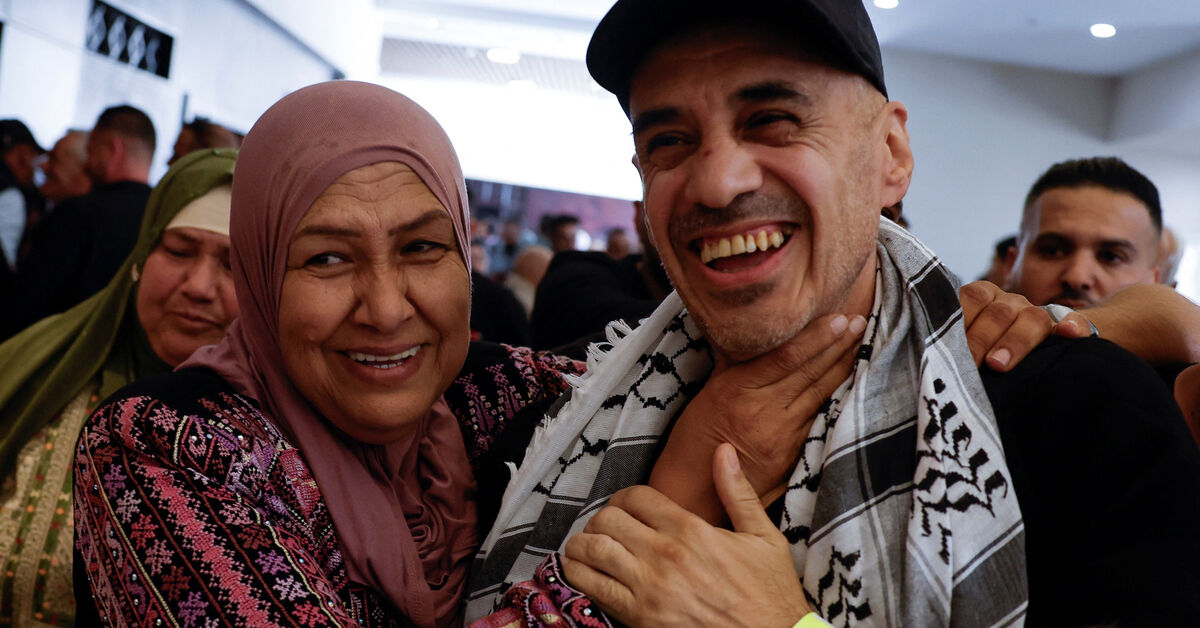 Palestinians cheer as freed prisoners begin to arrive home under ceasefire deal