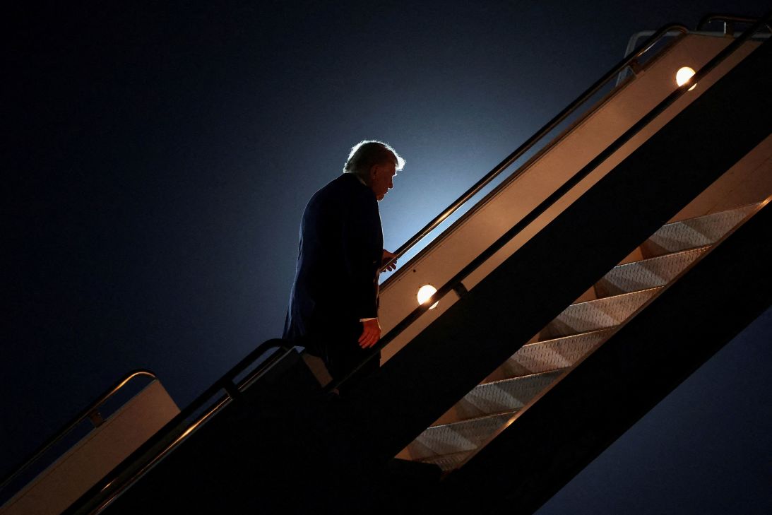 US President Donald Trump boards Air Force One en route to Washington, DC, after participating in a world leaders' summit in Sharm el-Sheikh, Egypt, on Monday.