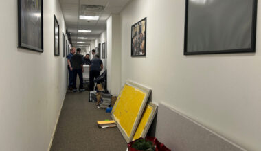 Journalists pose on the steps of the Pentagon in Washington