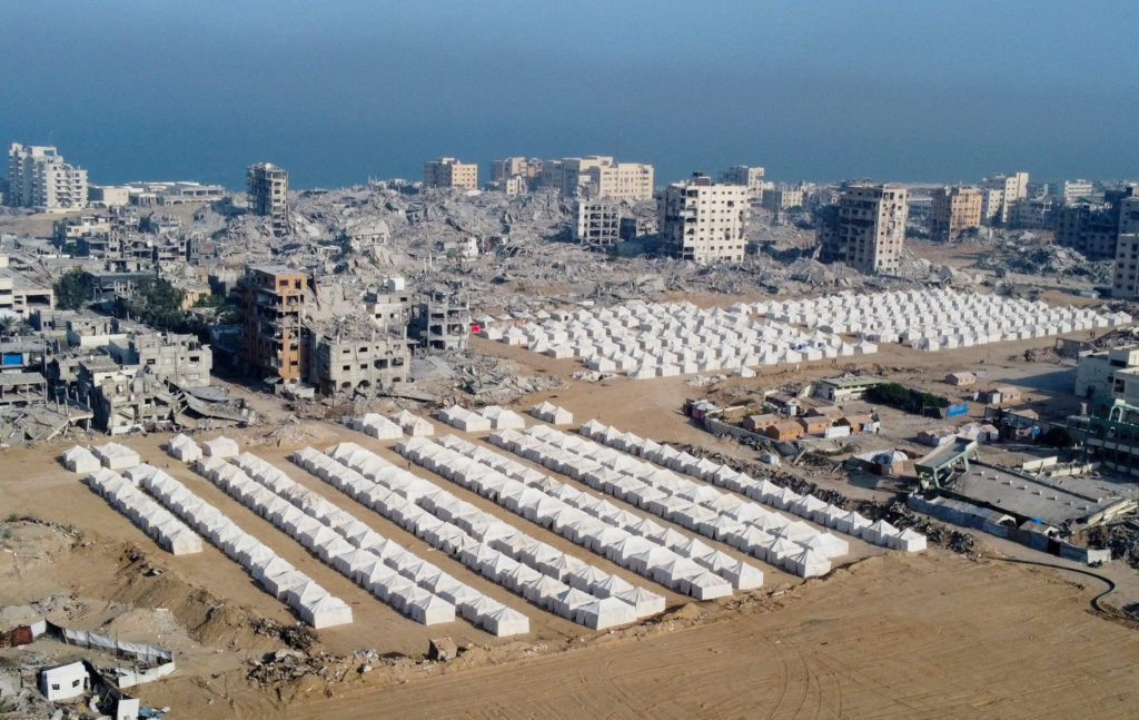 A drone view shows the destruction in a residential neighborhood, in Gaza City
