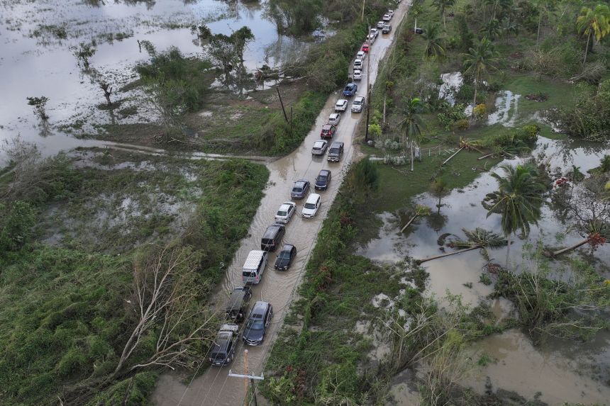 Traffic and flooding are seen after Hurricane Melissa made landfall in St Elizabeth, Jamaica, on Wednesday.