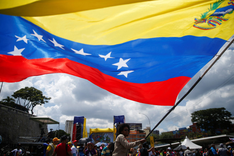 Venezuelans attend a rally in support of Venezuelan President Nicolas Maduro, amid rising tensions with the United States, in Caracas politics political venezuelan venezuela flag