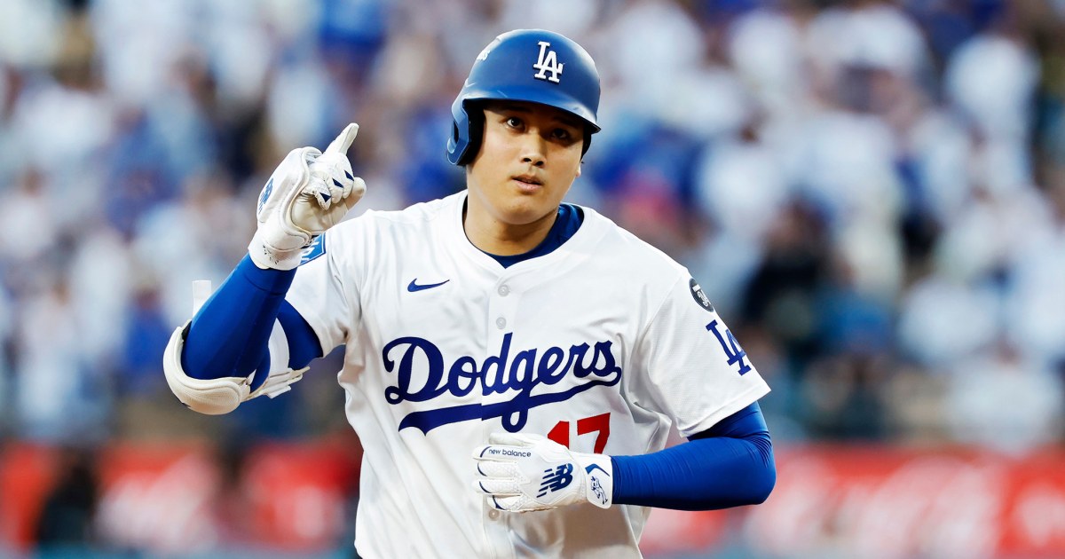 Ohtani hits 3 HRs as Dodgers sweep Brewers to clinch World Series berth