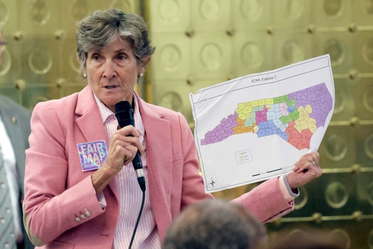 Rep. Pricey Harrison, D-Guilford, holds an alternative map as she speaks on a redistricting bill at the Legislative Building, Wednesday, Oct. 22, 2025, in Raleigh, N.C.