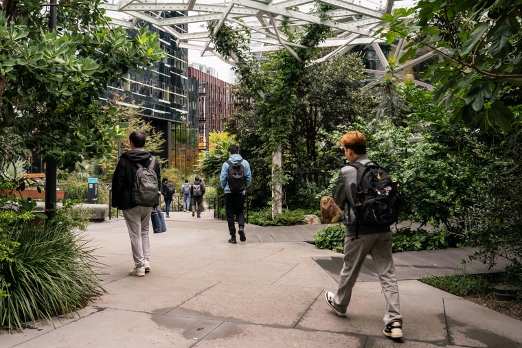 Employees walking in the Amazon headquarters.