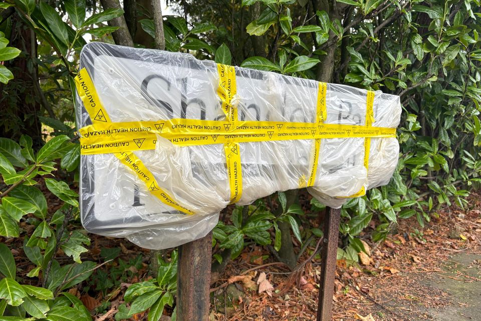 The damaged sign in east Belfast. Photo: Kirsten Elder for Belfast Telegraph