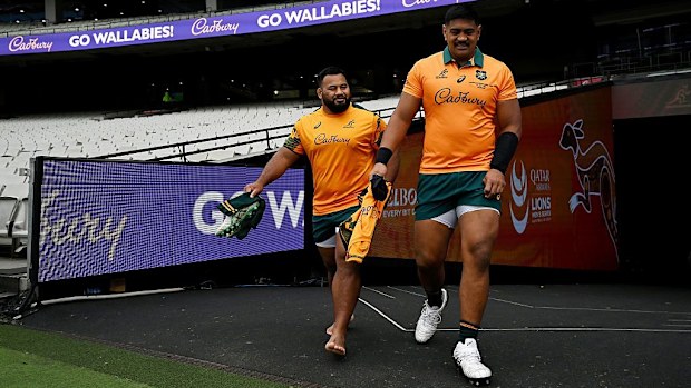 Taniela Tupou and Will Skelton make their way onto the pitch.