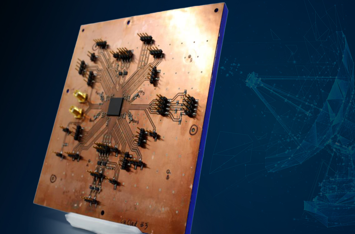 Closeup of a chip-sized processor and 3D printed antenna array.