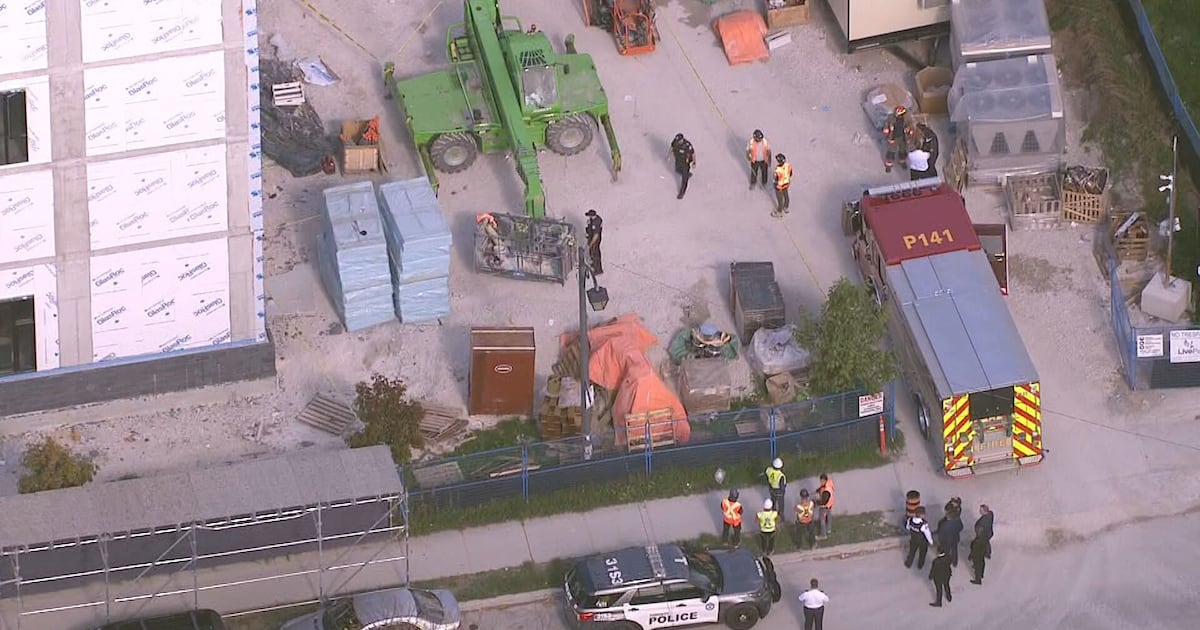 2 hurt after cherry-picker catches fire in North York