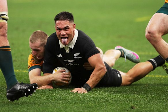 New Zealand’s Quinn Tupaea reacts after scoring one of his two tries. 