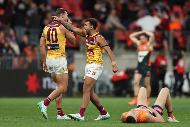 Callum Ah Chee celebrates the Lions' win. Credit: Getty Images