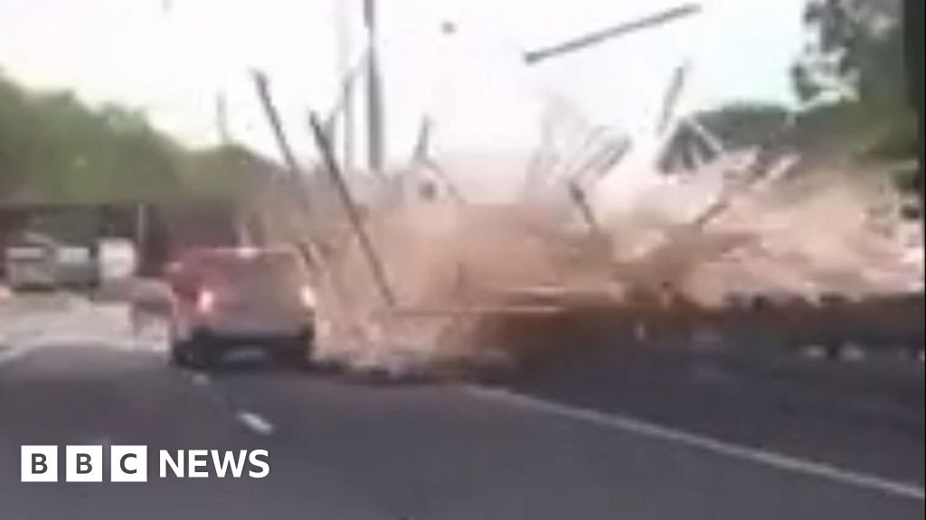 Lorry driver dies as load smashes onto M8 motorway from bridge
