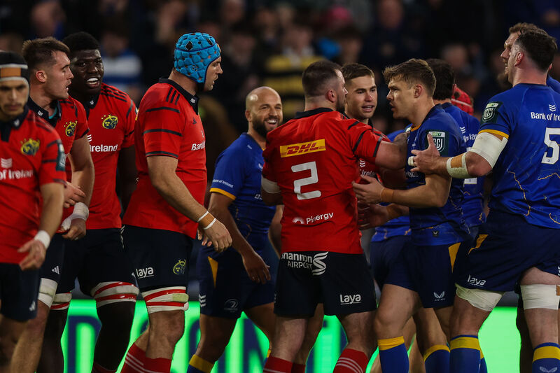 CLOSE AND PERSONAL: Tempers flare between Munster's Tadhg Beirne, Diarmuid Barron and Jack Crowley next to Leinster's Garry Ringrose 