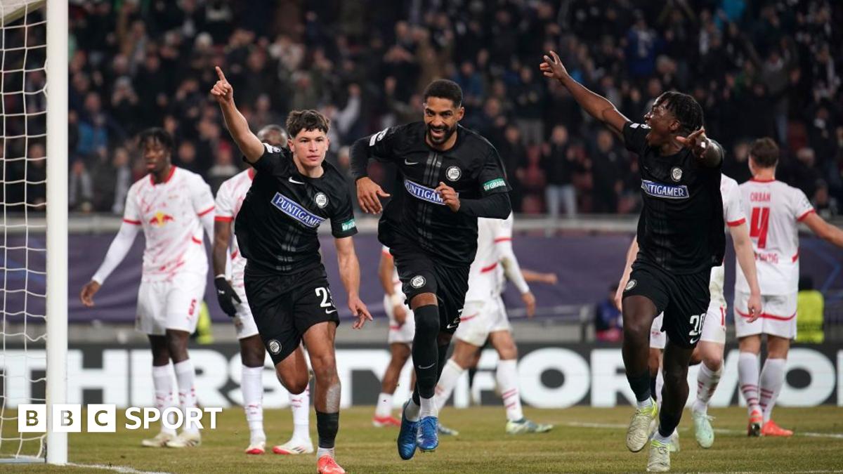 Arjan Malic of SK Sturm Graz celebrates scoring his team's first goal with team mates Seedy Jatta (R) and Gregory Wuethrich (C) during the UEFA Champions League 2024/25 League Phase MD8 match between SK Sturm Graz and RB Leipzig at Woerthersee Stadion