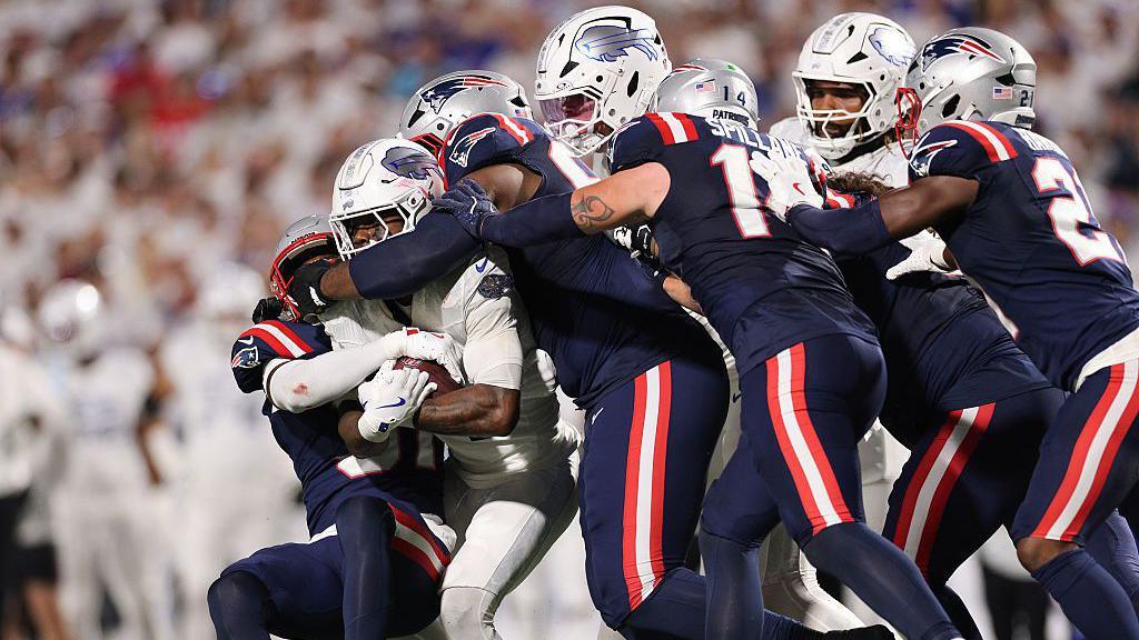New England Patriots defenders tackle James Cook of the Buffalo Bills