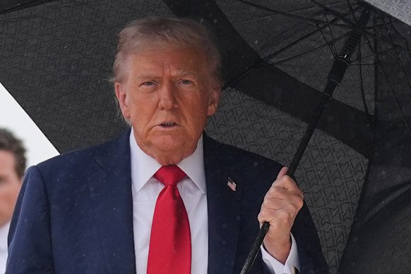 US President Donald Trump prepares to board Air Force One on Sunday.