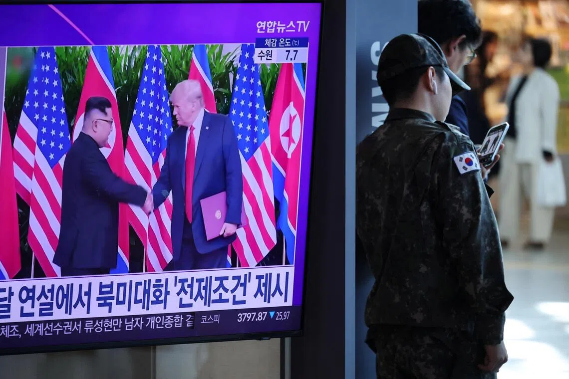 A TV in South Korea's Seoul on Oct 22, broadcasting a news report on a possible meeting between North Korean leader Kim Jong Un and US President Donald Trump.