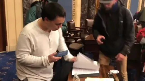 US Attorney's Office Patrick Moynihan after breaching th Senate Chamber