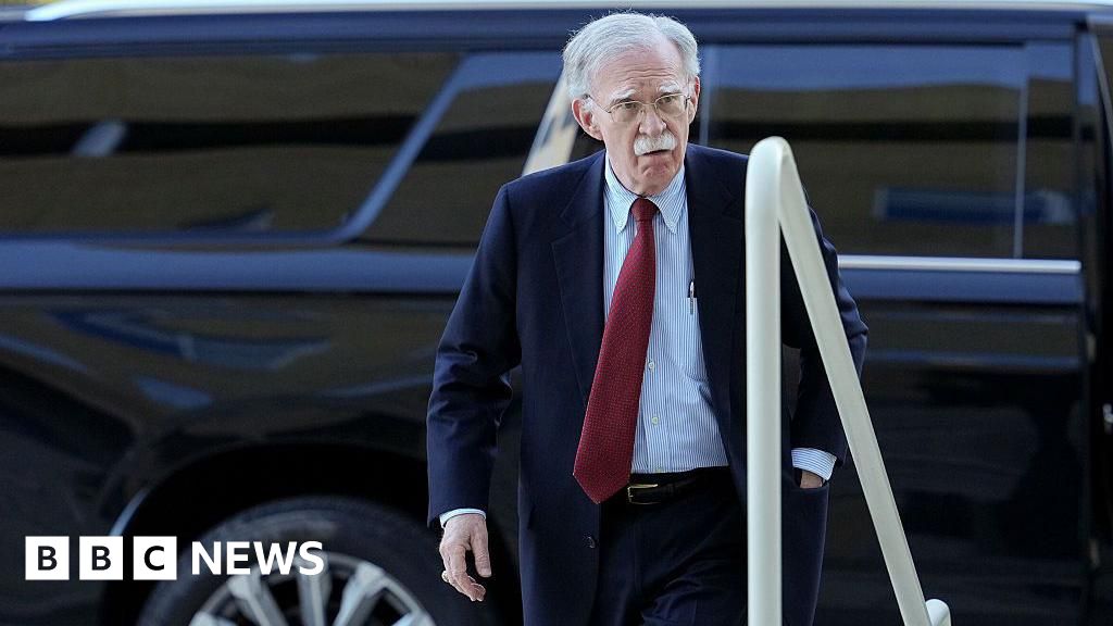 Ex-Trump adviser Bolton surrenders to face charges of sharing classified documents
