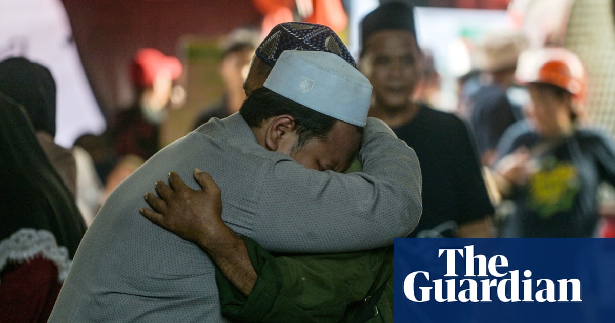 No apology and no answers: parents in agony amid search for children trapped in Indonesia school collapse | Indonesia