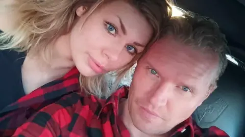 Claire Leveque Claire Leveque and Aren Pearson looking at the camera.