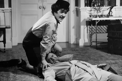 Getty Images Patricia Routledge and Jerry Lewis in Don't Raise the Bridge, Lower the River