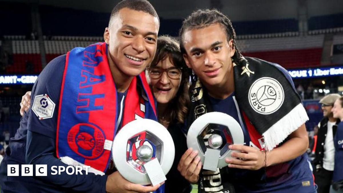 Kylian Mbappe and his brother Ethan along with their mother