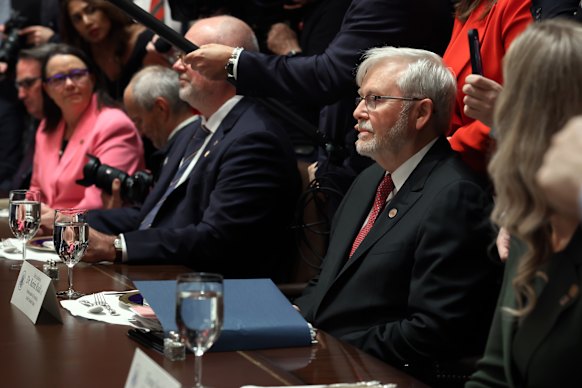 US ambassador Kevin Rudd, sitting across the table from  Donald Trump.
