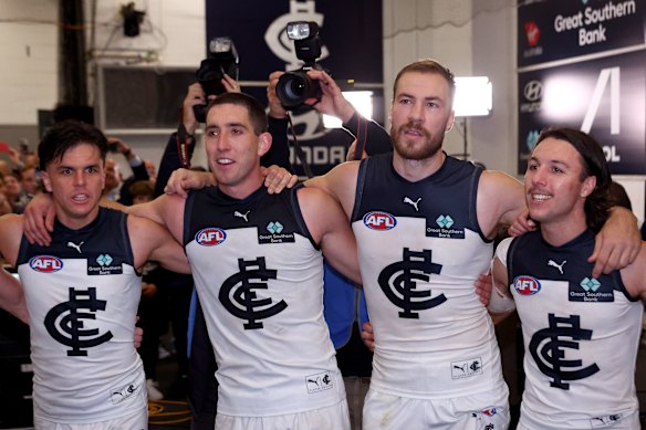 Blues (from left) Elijah Hollands, Jacob Weitering, Harry McKay and Oliver Hollands sing the club’s song after the win over St Kilda in round nine.