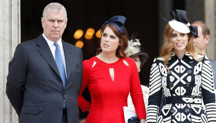 Prince Andrew with his daughters, Princess Eugenie and Princess Beatrice: File photo