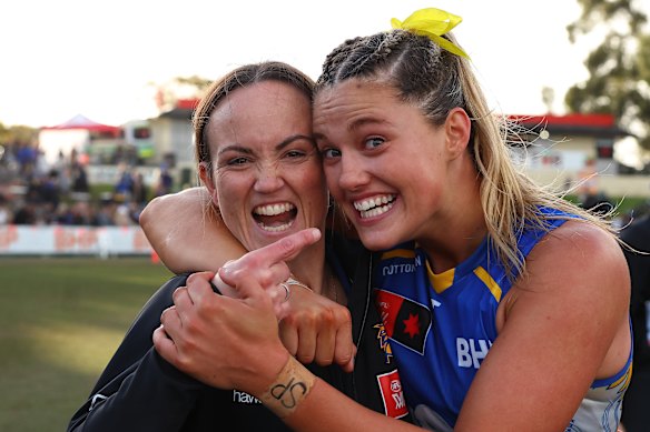 West Coast coach Daisy Pearce shares a moment with Georgie Cleaver. A win over Carlton will give her a finals berth in her second season as coach. 