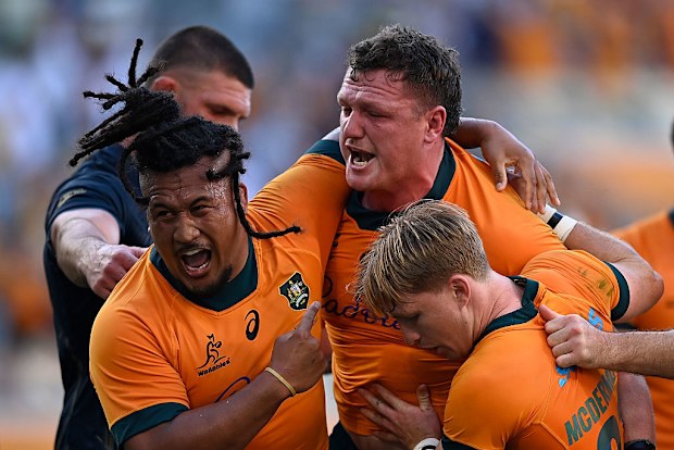 The Wallabies celebrate at Queensland Country Bank Stadium.