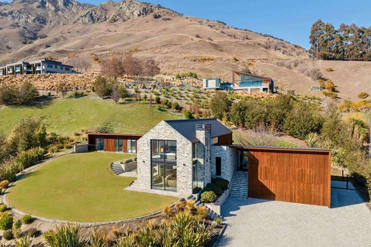 A trophy home on Beacon Point Road, in Wanaka, was snapped up in April this year for <img4 million. Photo / Supplied