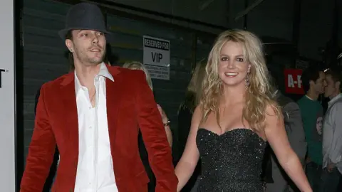 Jason Merritt via Getty Images Britney Spears and Kevin Federline are seen walking into an event